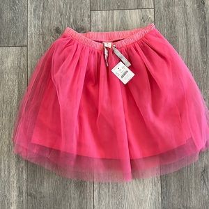 Girls Medium. Around size 8. Never worn, new with tags.